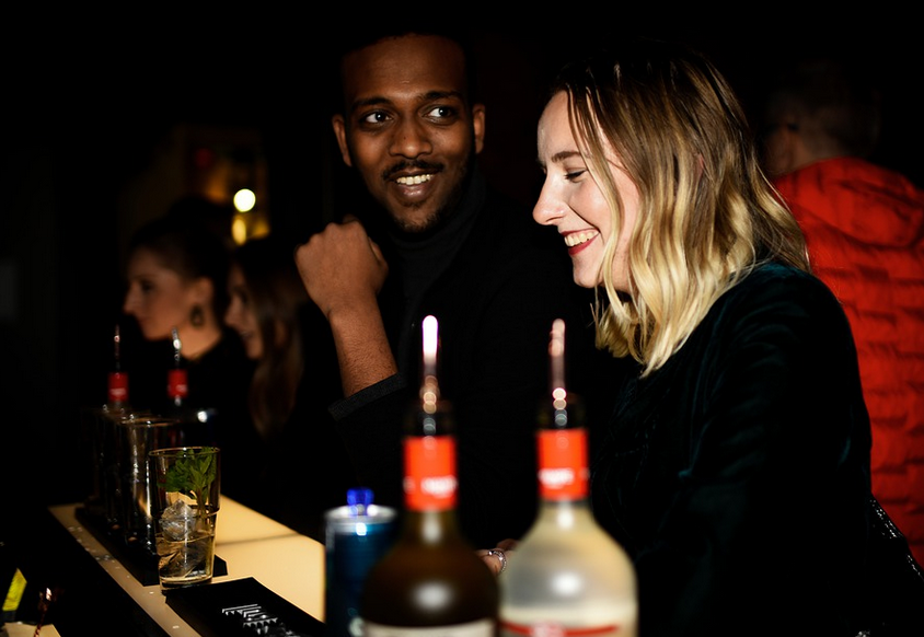 two people drinking alcohol
